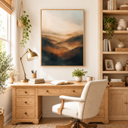 Home office mockup of misty mountain sunset canvas wall art above a wood desk