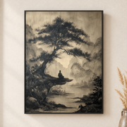 Framed canvas wall art depicting a dark twisting tree above a misty river rendered in soft black ink tones on a neutral wall