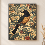 Framed canvas wall art depicting an orange and black songbird perched among curling cream and gold foliage on a neutral wall