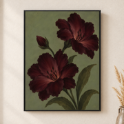 Framed canvas wall art depicting two deep burgundy poppy blossoms with dark stems on an olive green backdrop on a neutral wall