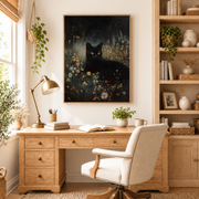 Home office mockup of black cat in wildflowers canvas wall art above a wood desk