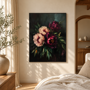Framed burgundy and blush peony canvas art beside a cozy bed in a neutral bedroom