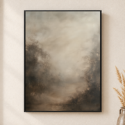 Framed canvas wall art depicting a pale beige-gray haze with subtle shadowy forest forms fading into fog on a neutral wall