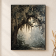 Framed canvas wall art depicting an old moss-draped tree archway above a soft misty woodland opening on a neutral wall