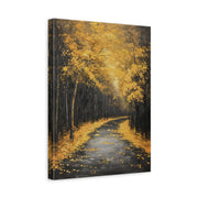 Unframed gallery wrapped canvas depicting a winding woodland road covered in golden leaves beneath tall autumn trees