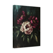 Unframed gallery wrapped canvas depicting large burgundy peonies and a pale pink bloom among dark leaves