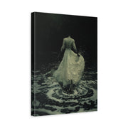 Unframed gallery wrapped canvas depicting a woman in a pale flowing gown surrounded by dark rippling water