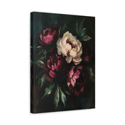 Unframed gallery wrapped canvas depicting blush peonies and dark burgundy flowers rising from dense green foliage